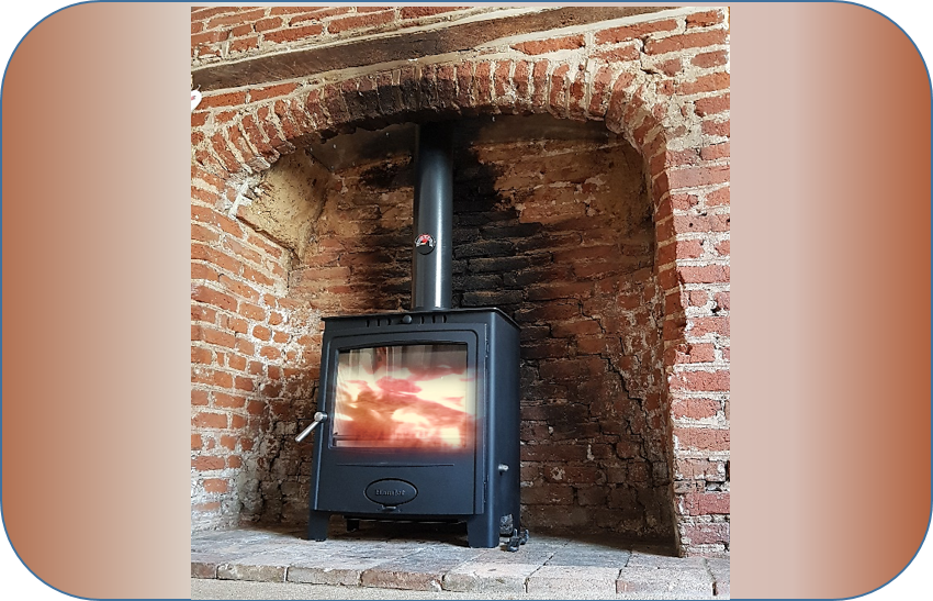 Hamlet Solution MF stove with rustic firebox and tiled hearth. Smoke Exempt appliance (DEFRA approved)
